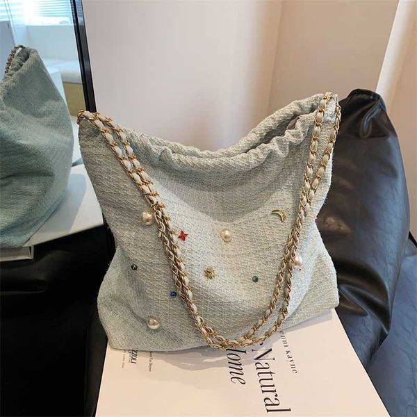 evening bags small design bucket bag summer new chain cute diamond embedding shoulder versatile women's crossbody 230704
evening bags small design bucket bag summer new chain cute diamond embedding shoulder versatile women's crossbody 230704