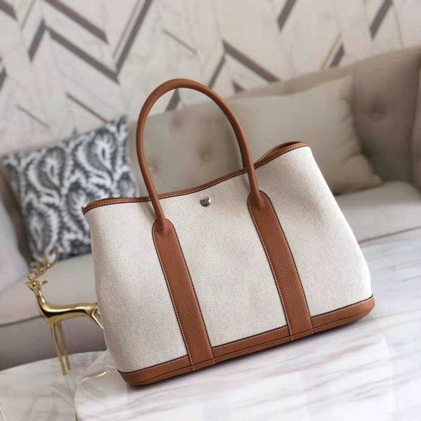 designer herbags mas s tote bags garden party canvas with layer cowhide women's bag garden new handbag leather contrast single shoulder
designer herbags mas s tote bags garden party canvas with layer cowhide women's bag garden new handbag leather contrast single shoulder