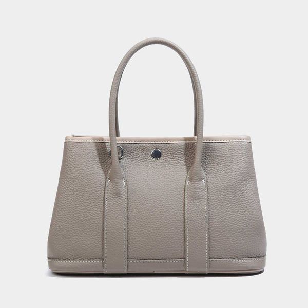 designer herbags mas s tote bags garden party version the new of cowhide garden bag on the first floor is simple and fashionable large capac
designer herbags mas s tote bags garden party version the new of cowhide garden bag on the first floor is simple and fashionable large capac