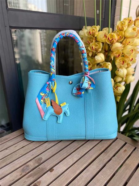 designer herbags mas s tote bags garden party layer togo cowhide bag new genuine leather bucket fashion portable garden women's rgr
designer herbags mas s tote bags garden party layer togo cowhide bag new genuine leather bucket fashion portable garden women's rgr
