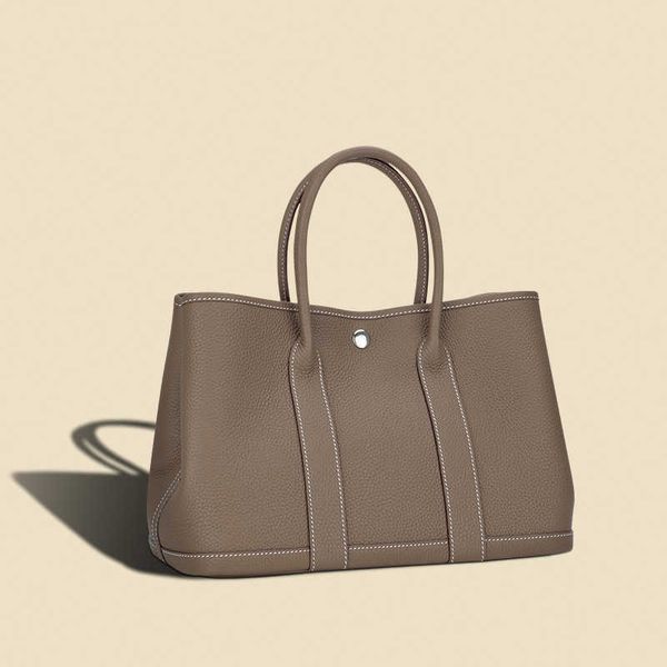 designer bags garden party lychee patterned togo garden bun layer cowhide women's bag commuting large capacity vegetable tanned portabl
designer bags garden party lychee patterned togo garden bun layer cowhide women's bag commuting large capacity vegetable tanned portabl