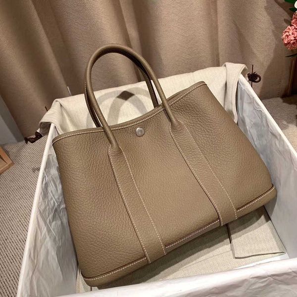 designer bags garden party new lychee grain layer cowhide garden bag women's shopping bucket large capacity single shoulder cross body
designer bags garden party new lychee grain layer cowhide garden bag women's shopping bucket large capacity single shoulder cross body
