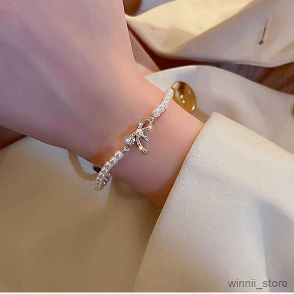 charm bracelets fashionable sweet bow pearl bracelet women design high-level versatile simple hand string personality jewelry r230704, Golden;silver
charm bracelets fashionable sweet bow pearl bracelet women design high-level versatile simple hand string personality jewelry r230704, Golden;silver