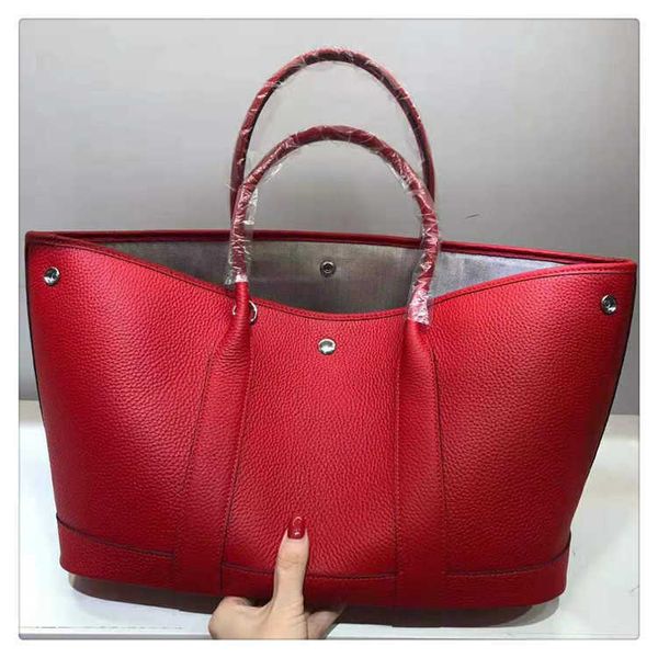 garden party designer hemrres tote bags garden party bag inner 2023 new cowhide fashion one shoulder handbag bridal wedding big 0011
garden party designer hemrres tote bags garden party bag inner 2023 new cowhide fashion one shoulder handbag bridal wedding big 0011