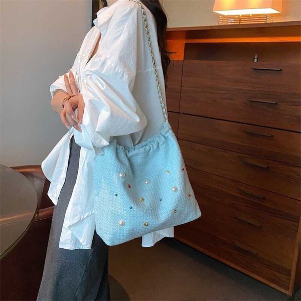 evening bags small design bucket bag summer chain cute diamond embedding shoulder versatile women's crossbody 230704
evening bags small design bucket bag summer chain cute diamond embedding shoulder versatile women's crossbody 230704