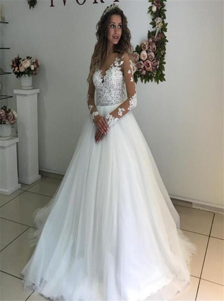 elegant lace appliques long sleeves wedding dresses ball gowns see through white tulle bridal dress vestidos de novias1383074
elegant lace appliques long sleeves wedding dresses ball gowns see through white tulle bridal dress vestidos de novias1383074