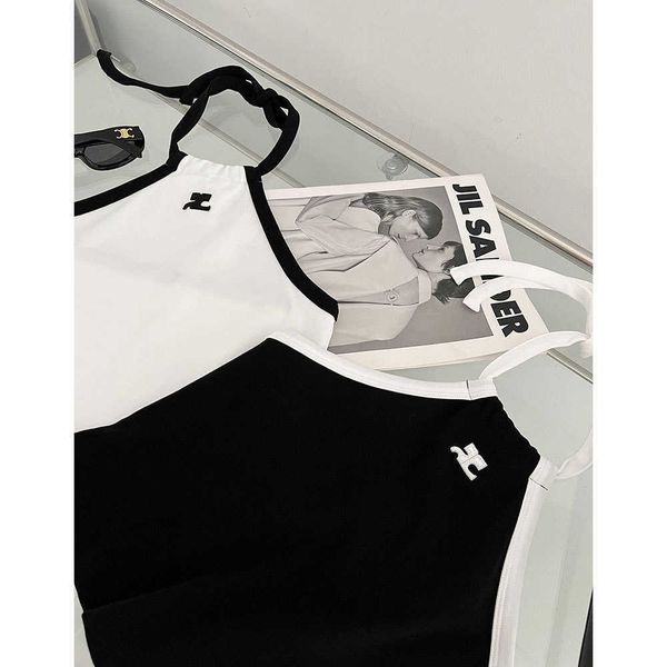 courreges contrast letter hanging neck open back short strap elastic waist straight barrel skirt set xy3807, White
courreges contrast letter hanging neck open back short strap elastic waist straight barrel skirt set xy3807, White