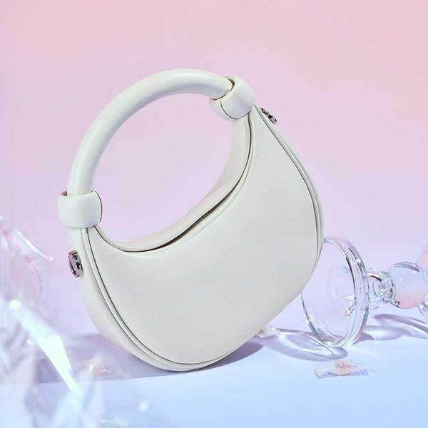 new cowhide handbag exquisite rose small bag women's crossbody bag crescent bag fashion women's bag
new cowhide handbag exquisite rose small bag women's crossbody bag crescent bag fashion women's bag