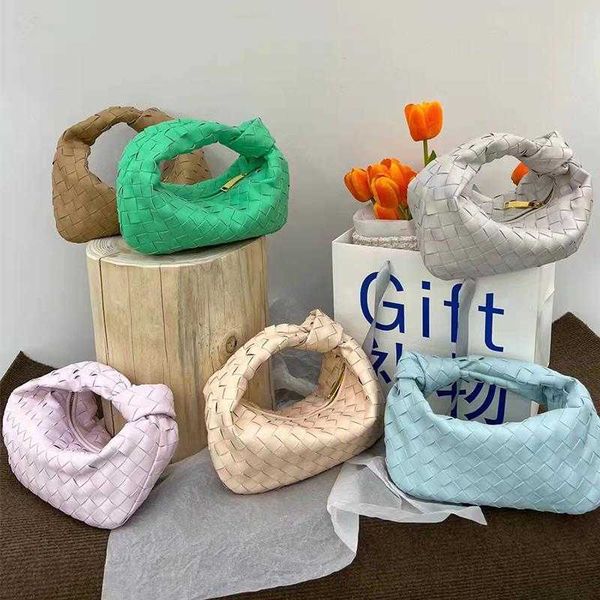 this season's new fashion pure hand-woven dumpling bag temperament handbag trend all match personality horn designer bag
this season's new fashion pure hand-woven dumpling bag temperament handbag trend all match personality horn designer bag