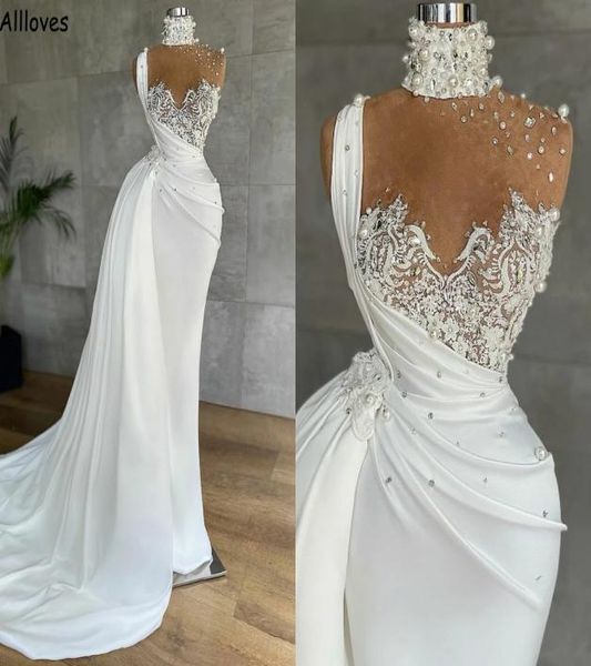 saudi arabia dubai mermaid wedding dresses with detachable train pearls lace applique beaded bridal gowns high neck modern robes d1401262, White
saudi arabia dubai mermaid wedding dresses with detachable train pearls lace applique beaded bridal gowns high neck modern robes d1401262, White