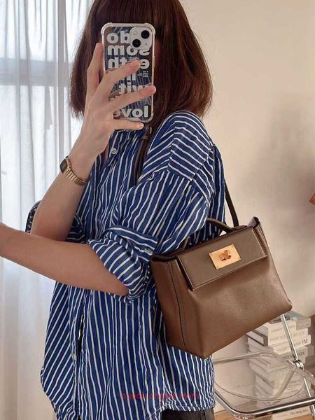 h home designer 2424 tote bags for sale lock buckle leather womens bag mini2424 head layer cow leather bag multifunctional single shoul
h home designer 2424 tote bags for sale lock buckle leather womens bag mini2424 head layer cow leather bag multifunctional single shoul