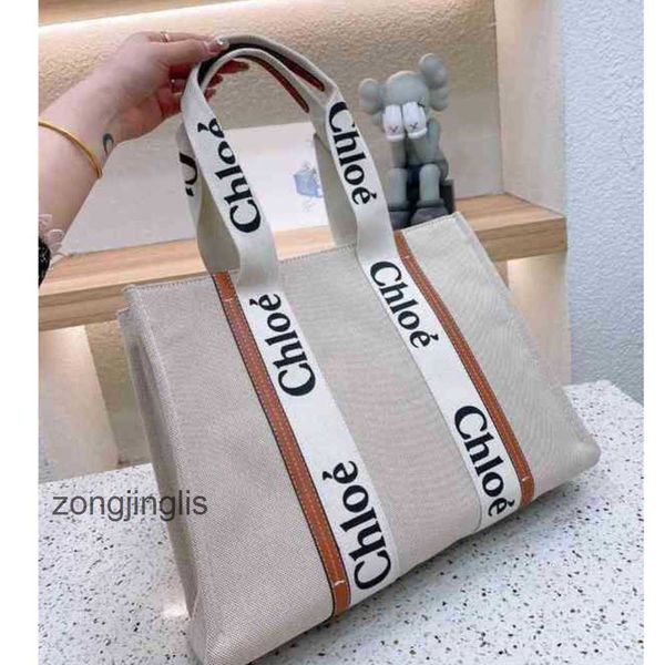 tote handbag cloe bags designer bag hands 2023 woody fashion one outlet shoulder canvas niche design portable large tote women's capaci
tote handbag cloe bags designer bag hands 2023 woody fashion one outlet shoulder canvas niche design portable large tote women's capaci