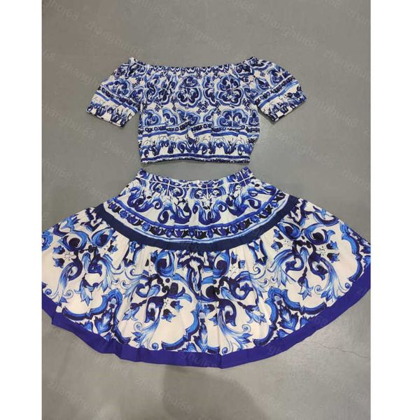23ss womens designer clothing skirt set one-line shoulder blue and white porcelain printed short sleeve t-shirt half skirt sets womens cloth
23ss womens designer clothing skirt set one-line shoulder blue and white porcelain printed short sleeve t-shirt half skirt sets womens cloth