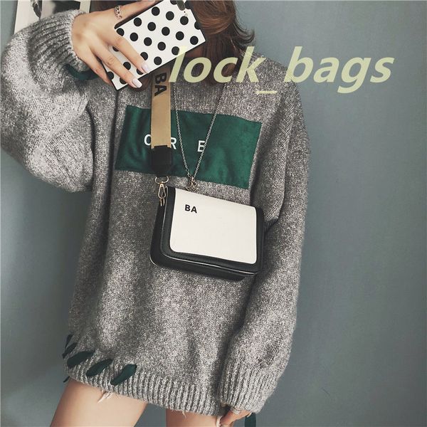 designer crossbody bag men's and women's shoulder buckle fashion trend handbag black and white stitching brand casual handbag
designer crossbody bag men's and women's shoulder buckle fashion trend handbag black and white stitching brand casual handbag