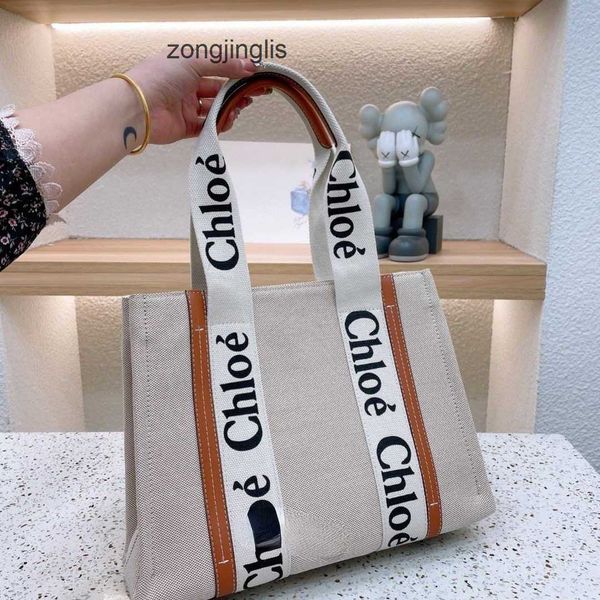 designer 2023 bag hands bags outlet handbag cloe tote fashion beach woody one shoulder canvas niche design portable large tote women's
designer 2023 bag hands bags outlet handbag cloe tote fashion beach woody one shoulder canvas niche design portable large tote women's