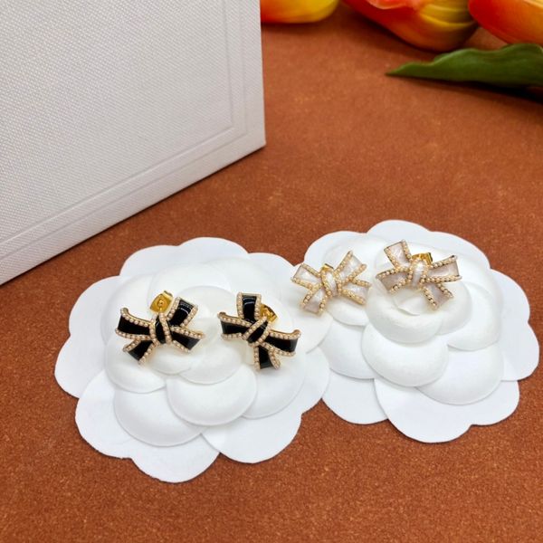 designer earrings for women classic small fragrant wind earrings lovely and sweet new 18k gold light luxury flash black and white bow, Golden;silver
designer earrings for women classic small fragrant wind earrings lovely and sweet new 18k gold light luxury flash black and white bow, Golden;silver