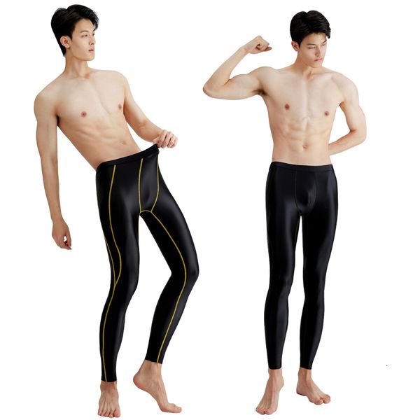 men's swimwear satin oil glossy pants for nude men quick drying shiny swimming high elastic surfing legs 230705
men's swimwear satin oil glossy pants for nude men quick drying shiny swimming high elastic surfing legs 230705