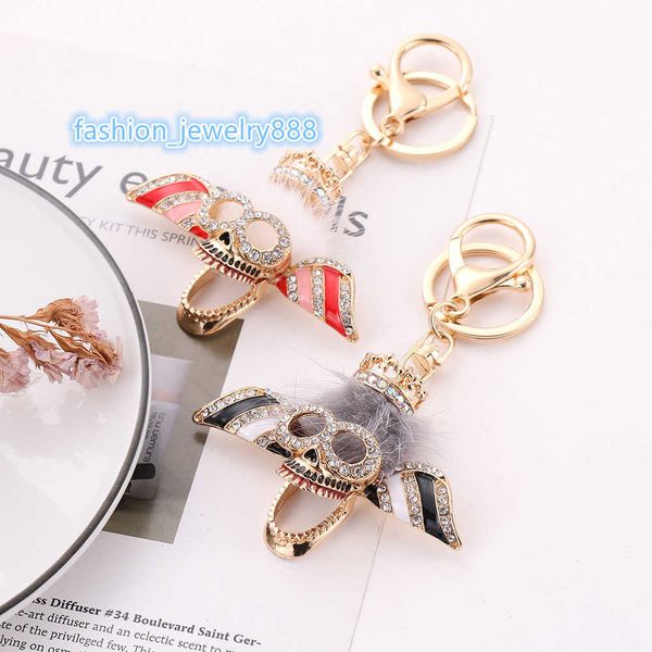 new style diamond inlaid hair ball skull creative metal key ring three dimensional hollow car bag pendant, Slivery;golden
new style diamond inlaid hair ball skull creative metal key ring three dimensional hollow car bag pendant, Slivery;golden