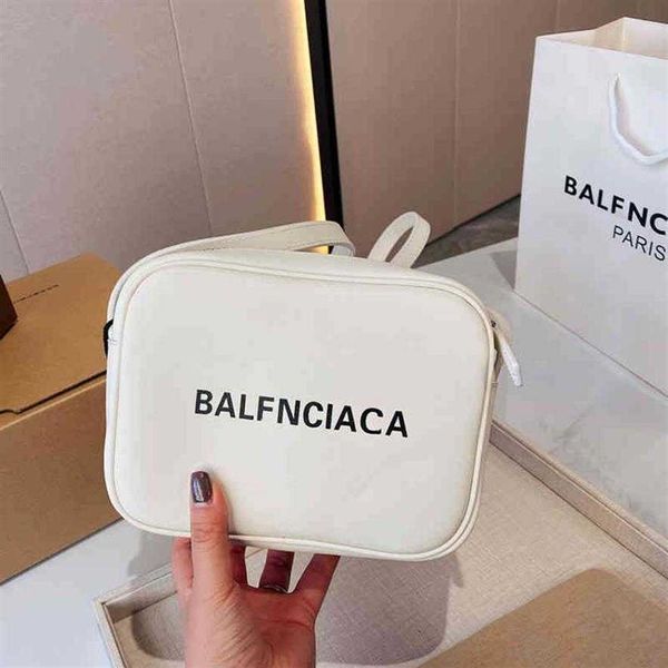 designer bag handbag black and white printed letter digital camera bag women's fashion messenger bag shoulder bag locomotive
designer bag handbag black and white printed letter digital camera bag women's fashion messenger bag shoulder bag locomotive