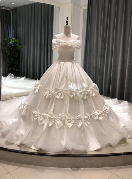 white tulle satin off the shoulder wedding dresses princess bow beaded pearls church royal bridal gown vestido de noiva
white tulle satin off the shoulder wedding dresses princess bow beaded pearls church royal bridal gown vestido de noiva