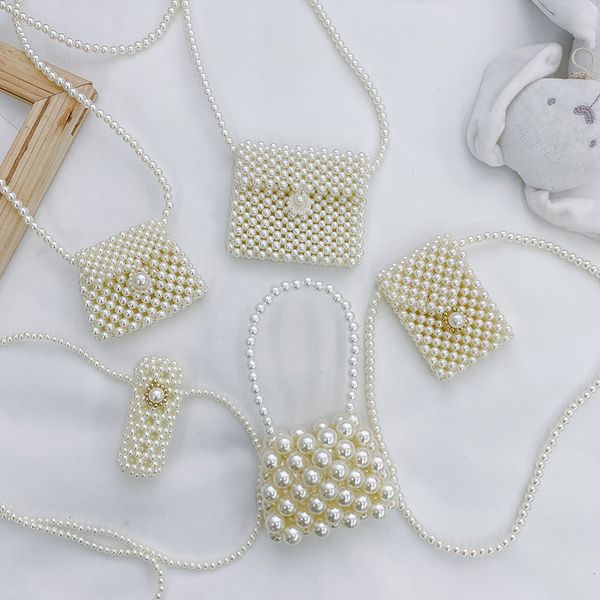 backpacks pearls handbags children's shoulder bag beading sweet small purses 2023 kids girls wallets 230705
backpacks pearls handbags children's shoulder bag beading sweet small purses 2023 kids girls wallets 230705