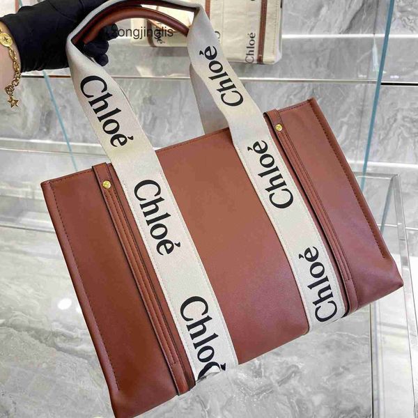 2023 woody tote handbag hands outlet bag minority cloe designer bags women's canvas tote large capacity foreign style portable fashion
2023 woody tote handbag hands outlet bag minority cloe designer bags women's canvas tote large capacity foreign style portable fashion