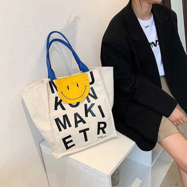 korea dongmen smiling face canvas bag spring new edition pu women's bag letter tote bag print
korea dongmen smiling face canvas bag spring new edition pu women's bag letter tote bag print