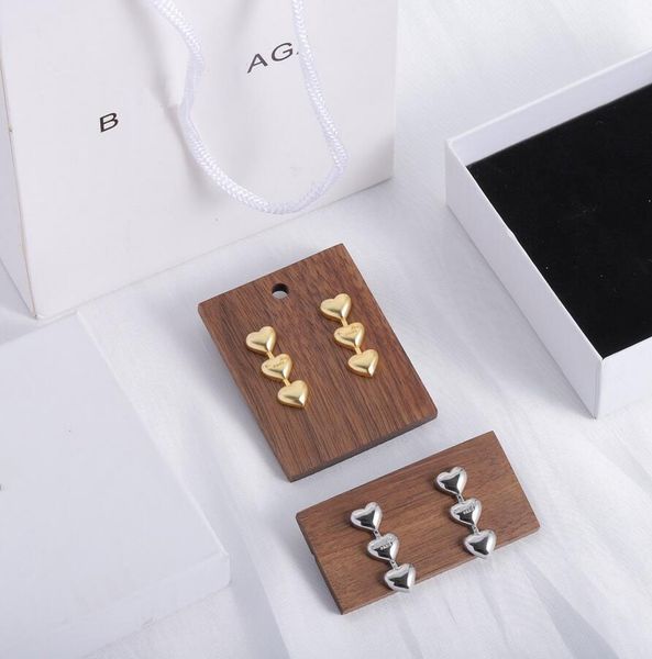 new 18k gold silver plated stud eardrop fashion designer heart charm dangle earring for women lady wedding engagement party gift, Golden;silver
new 18k gold silver plated stud eardrop fashion designer heart charm dangle earring for women lady wedding engagement party gift, Golden;silver