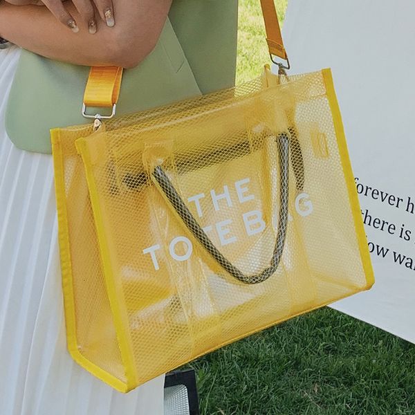 evening bags female yellow jelly bag letter print large pvc mesh ladies tote handbag summer beach waterproof transparent shoulder 230707
evening bags female yellow jelly bag letter print large pvc mesh ladies tote handbag summer beach waterproof transparent shoulder 230707