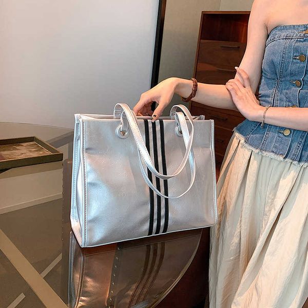 fashionable pu high capacity tote bag summer new texture stripe shoulder bag simple casual handbag
fashionable pu high capacity tote bag summer new texture stripe shoulder bag simple casual handbag