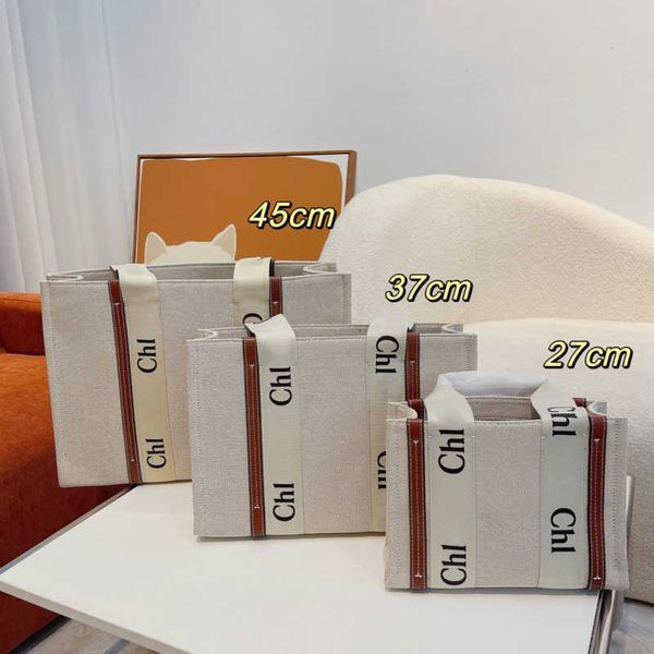 tote bag luxury designer woody totes shopping bags 10a canvas handbag crossbody bags shoulder bags travel beach bag wallet purses dh
tote bag luxury designer woody totes shopping bags 10a canvas handbag crossbody bags shoulder bags travel beach bag wallet purses dh