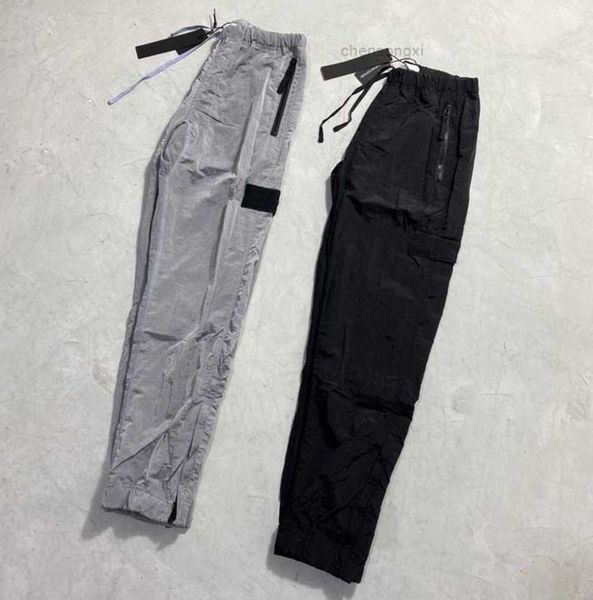 men's size brand designers stone metal nylon pocket embroidered badge casual trousers thin reflective island tidal flow design 639ess, Black;brown
men's size brand designers stone metal nylon pocket embroidered badge casual trousers thin reflective island tidal flow design 639ess, Black;brown