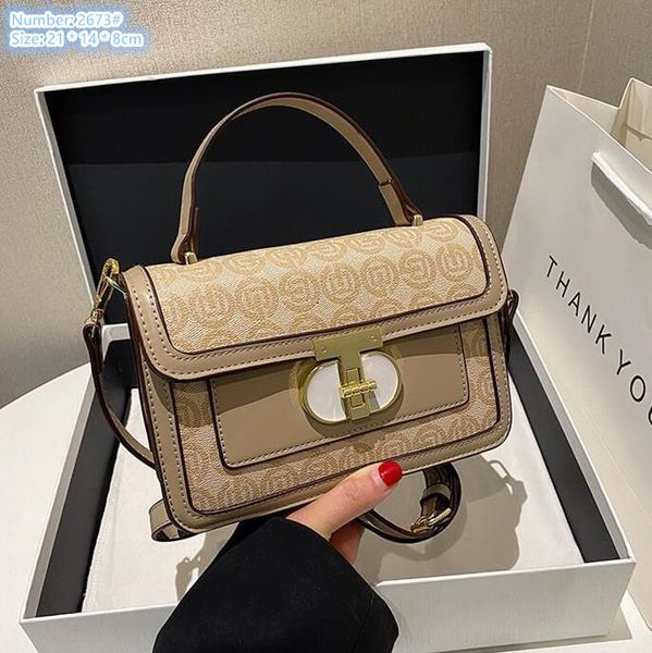 Factory wholesale ladies shoulder bags 2 colors flip gold buckle handbag street trend polka dot mobile phone coin purse Joker contrast leather backpack, Brown-2673#
Factory wholesale ladies shoulder bags 2 colors flip gold buckle handbag street trend polka dot mobile phone coin purse Joker contrast leather backpack, Brown-2673#