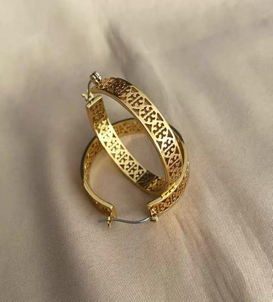 new jewelry fashion hollowed out exquisite texture double tletter earrings2801423, Golden
new jewelry fashion hollowed out exquisite texture double tletter earrings2801423, Golden