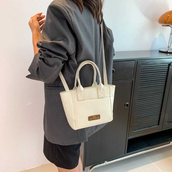 fashion canvas bag summer new small crowd texture shoulder bag simple large capacity portable tote bag
fashion canvas bag summer new small crowd texture shoulder bag simple large capacity portable tote bag
