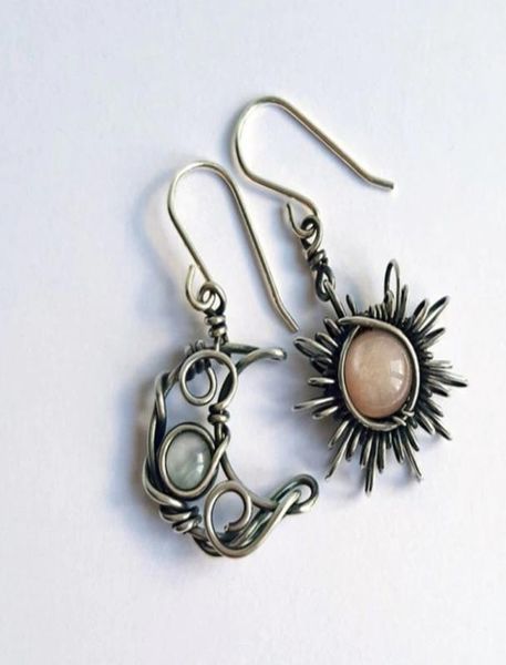 bohemian wind retro sun moon earrings moonstone asymmetric dangle8916439, Silver
bohemian wind retro sun moon earrings moonstone asymmetric dangle8916439, Silver
