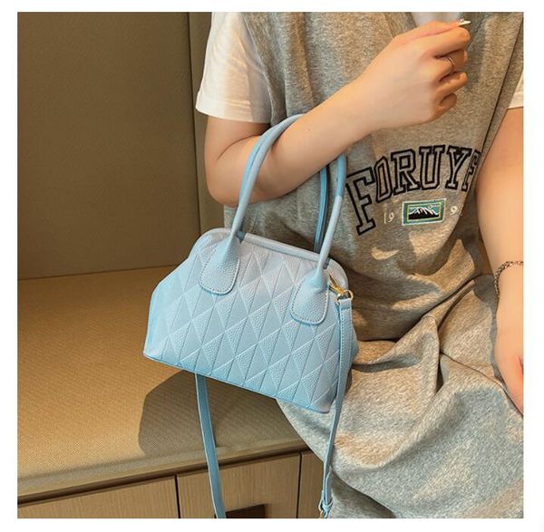simple and versatile handbag, solid color diamond grid fashion shoulder bag, shell bag, women's bag wholesale
simple and versatile handbag, solid color diamond grid fashion shoulder bag, shell bag, women's bag wholesale