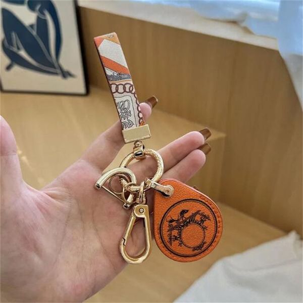 designers keychains luxurys keychain leather design fashion casual style key chain temperament leather letter pattern christmas gift to her, Silver
designers keychains luxurys keychain leather design fashion casual style key chain temperament leather letter pattern christmas gift to her, Silver