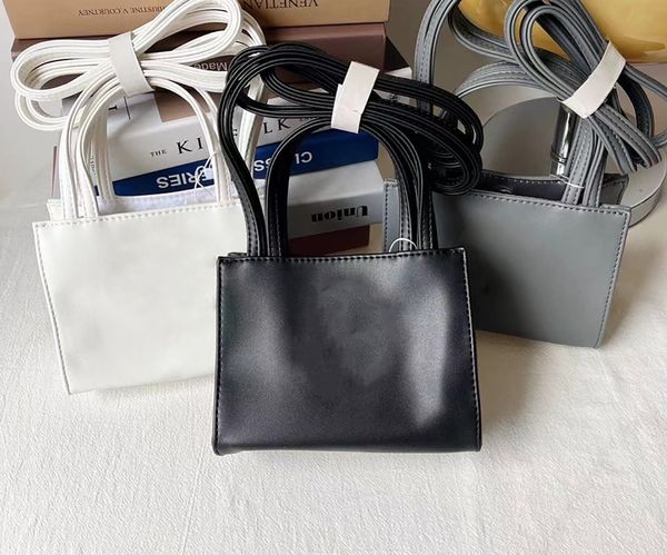 tote bag designer bag latest upgraded soft leather solid color mini 17cm shopping bag 20 colors simple fashion handbag long shoulder strap
tote bag designer bag latest upgraded soft leather solid color mini 17cm shopping bag 20 colors simple fashion handbag long shoulder strap