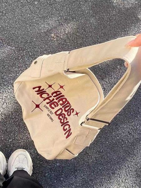 canvas bag for female college students in class ins lazy style large capacity single shoulder cross-body small embroidered tote bag
canvas bag for female college students in class ins lazy style large capacity single shoulder cross-body small embroidered tote bag