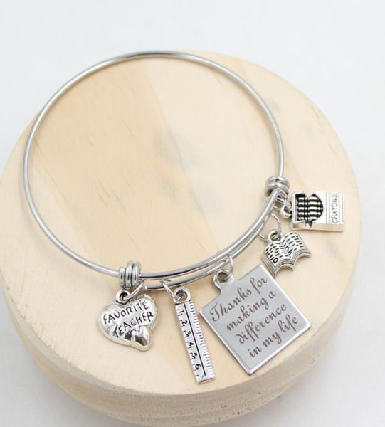 whole new arrival stainless steel wire bangle bracelet book ruler crayons favorite teacher charm bracelets for teacher039s 8845511, Golden;silver
whole new arrival stainless steel wire bangle bracelet book ruler crayons favorite teacher charm bracelets for teacher039s 8845511, Golden;silver