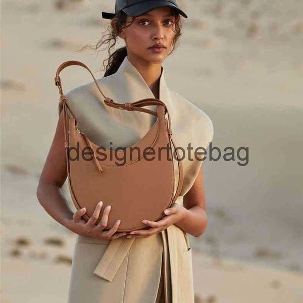 polene numero dix half-moon bag crescent moon armpit leather designer bag female spring and summer fashion french minority
polene numero dix half-moon bag crescent moon armpit leather designer bag female spring and summer fashion french minority