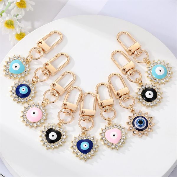 creative diamond set blue evil eye keychain pendant love alloy sun car bag devil's eye keychains jewelry gift in bulk, Silver 
creative diamond set blue evil eye keychain pendant love alloy sun car bag devil's eye keychains jewelry gift in bulk, Silver