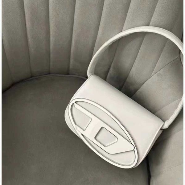 new dingdang underarm design women's one shoulder crossbody fashion advanced portable small square bag 
new dingdang underarm design women's one shoulder crossbody fashion advanced portable small square bag