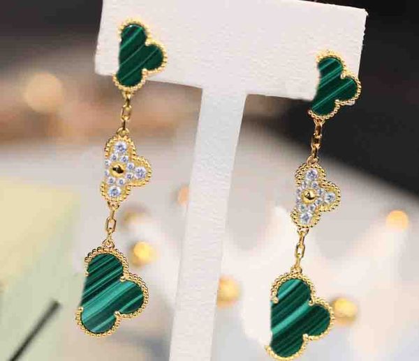 2023 luxury quality charm drop earring with three flowers white and black and grey shell in platinum for women wedding jewelry gift ps7244b, Golden
2023 luxury quality charm drop earring with three flowers white and black and grey shell in platinum for women wedding jewelry gift ps7244b, Golden