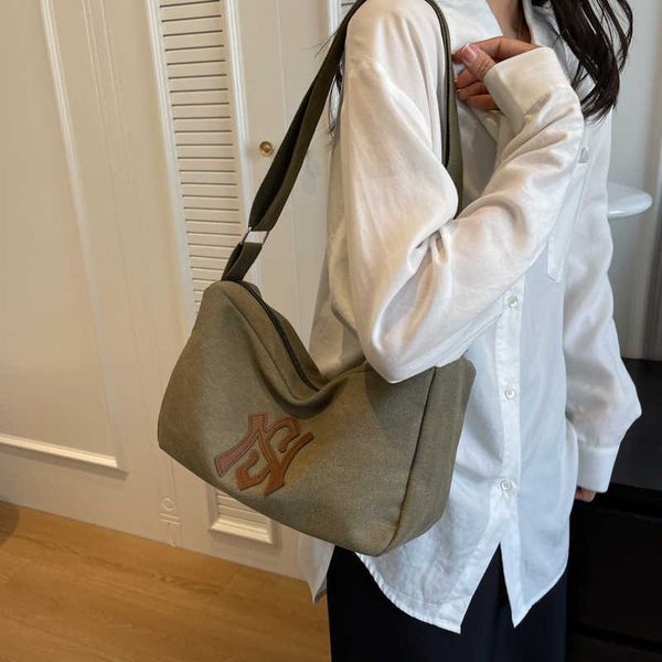 new canvas storage women's bag fashion versatile tote bag large capacity one shoulder crossbody bag
new canvas storage women's bag fashion versatile tote bag large capacity one shoulder crossbody bag