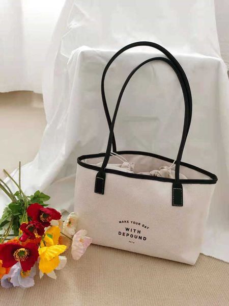 baobao women's new simple drawstring canvas bag ins bundle large capacity handheld one shoulder tote bag
baobao women's new simple drawstring canvas bag ins bundle large capacity handheld one shoulder tote bag
