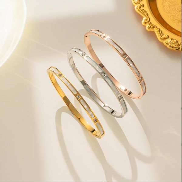 tennis new white shell inlaid diamond titanium steel bracelet women's simple and fashionable style rose gold open bracelet, Golden;silver
tennis new white shell inlaid diamond titanium steel bracelet women's simple and fashionable style rose gold open bracelet, Golden;silver