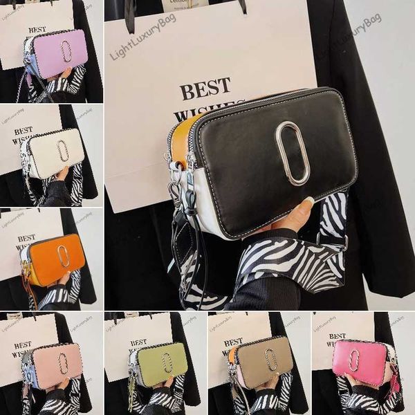 two-tone designer brand camera bag m crossbody bags zebra stripe strap fashion women shoulder wallets leather luxury tote classic female sho
two-tone designer brand camera bag m crossbody bags zebra stripe strap fashion women shoulder wallets leather luxury tote classic female sho