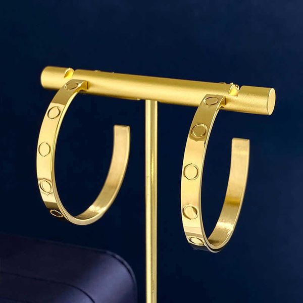 selling funds tyme earrings large style fashionable and elegant high-end sense carti titanium steel c-shaped screws ring female, Golden;silver
selling funds tyme earrings large style fashionable and elegant high-end sense carti titanium steel c-shaped screws ring female, Golden;silver